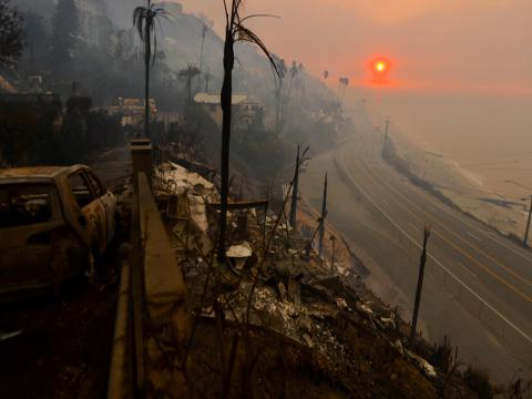 Wildfire destruction on coastal road